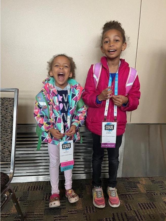 Figure 1: Two excited children wearing CCCC badges